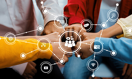 A group of people connecting hands together