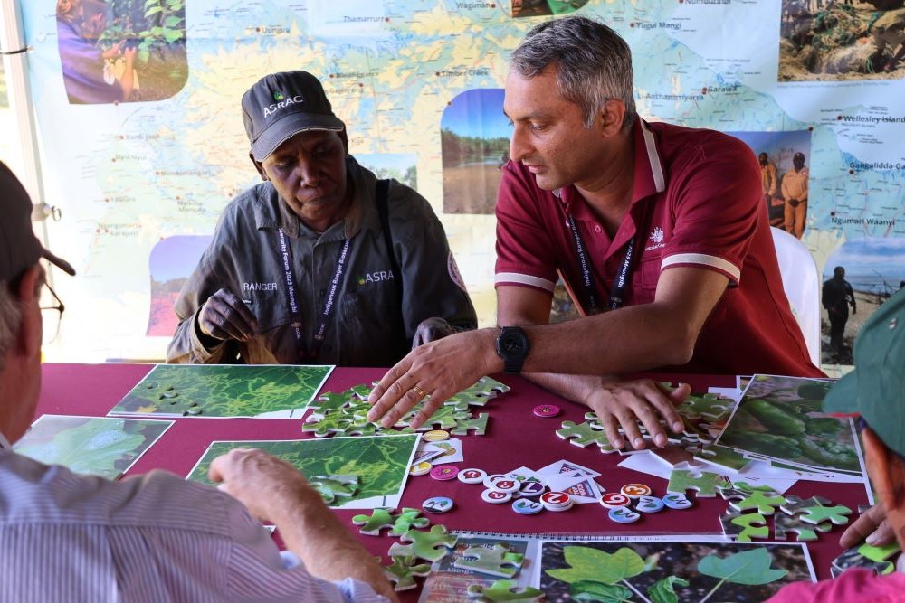 Gurrruwiling Ranger learning about biosecurity plant pests and diseases with DAFF's Senior Plant Pathologist, Harsh Vala