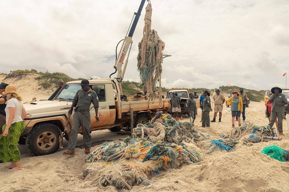 Removing a ghost net [copyright Timothy Hillier]