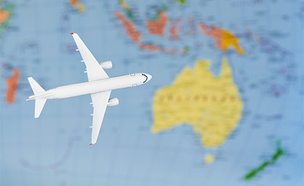 Map of asia-pacific countries with a plane flying towards Australia