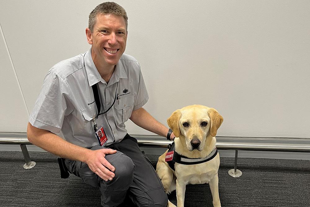 Biosecurity Officer and the detector dog