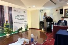 Agricultural Counsellor Monica Finlayson delivering an introduction at a podium during a conference in Vietnam